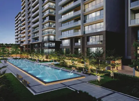 Lap pool and landscaped deck between towers