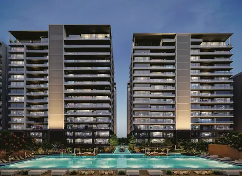 Twin towers above the lap pool at night