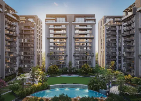 Avadh Elrica courtyard pool framed by the towers